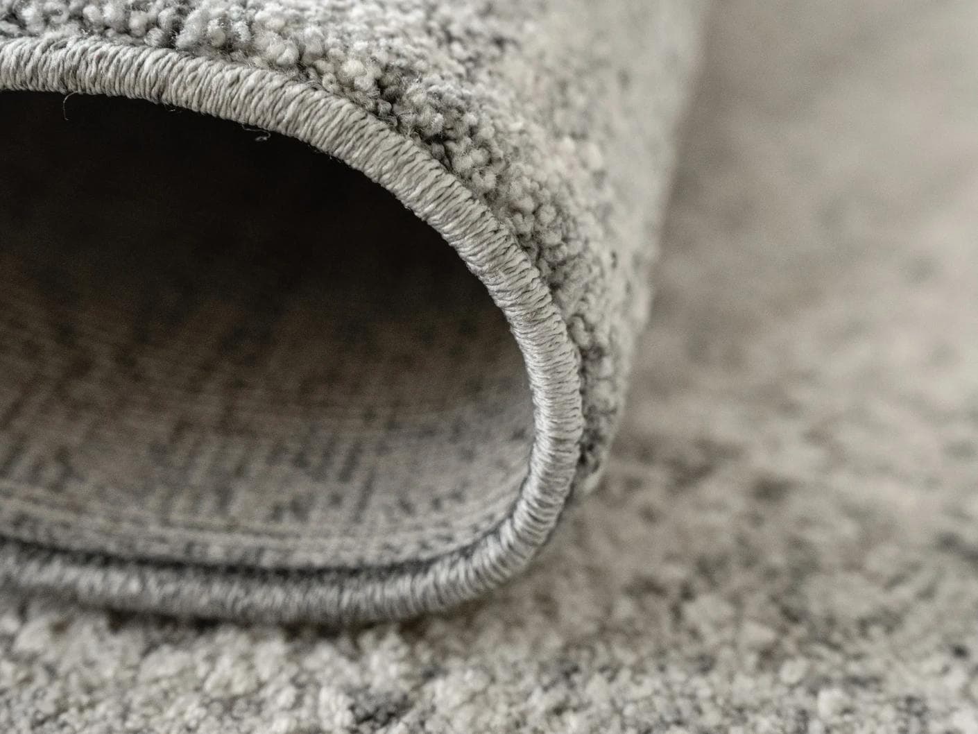 Finley Dune carpet in grey, shown in a product close-up as image 11
