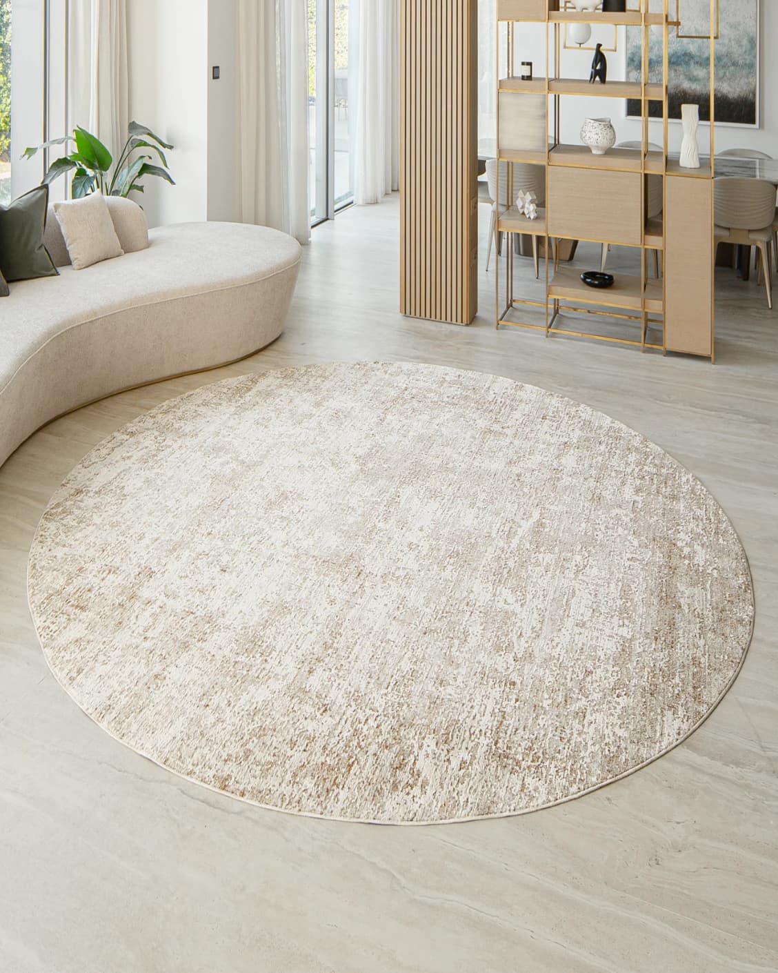 Finley Rust Round carpet in rust and beige, shown in a lifestyle front view as image 2