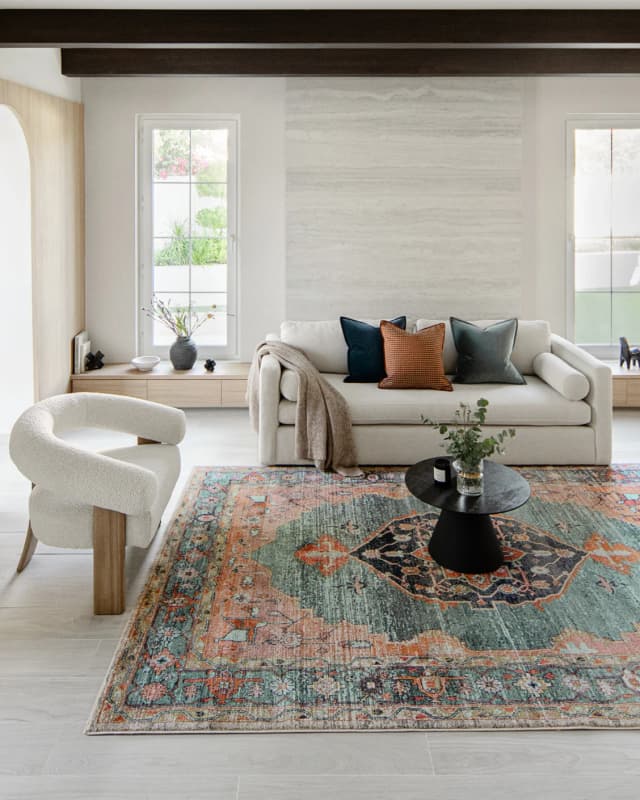 Frank Tiger carpets in blue, orange and multicolour, shown in a lifestyle right view as image 3