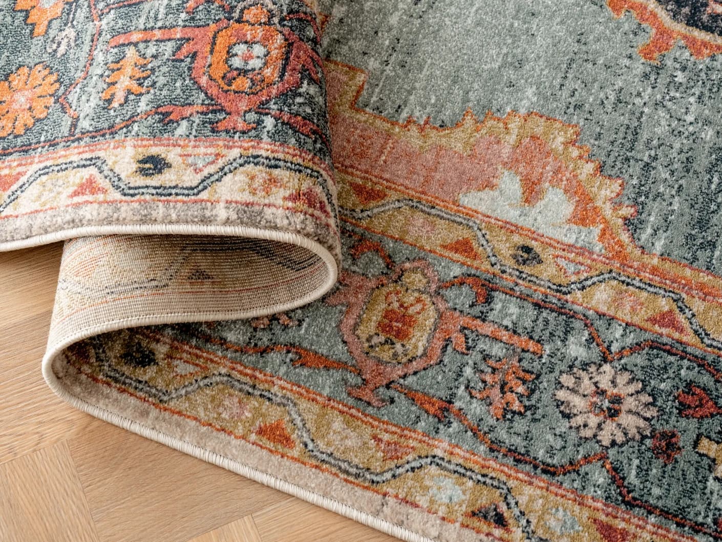 Frank Tiger Runners carpets in blue, orange and multicolour, shown in a product top view