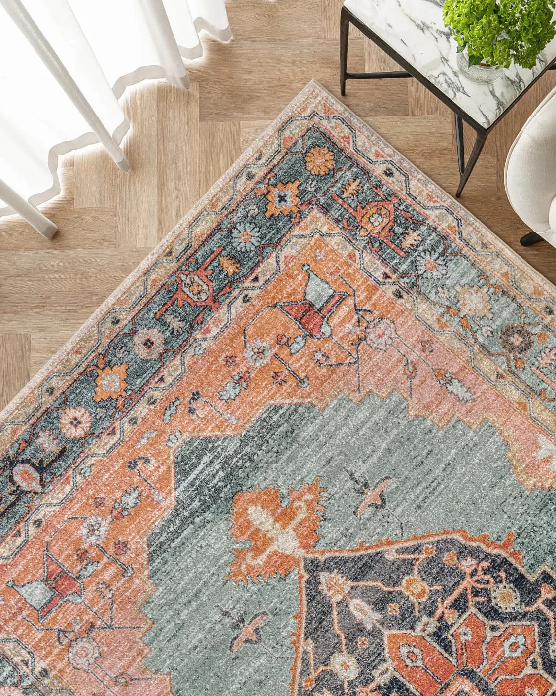 Frank Tiger carpet in blue, orange and multicolour, shown in a lifestyle top view as image 2