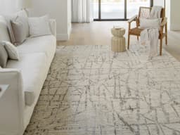 Freida Ashley carpet in grey and beige, shown in a lifestyle front view