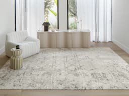 Freida Ashton carpet in grey and beige, shown in a lifestyle front view