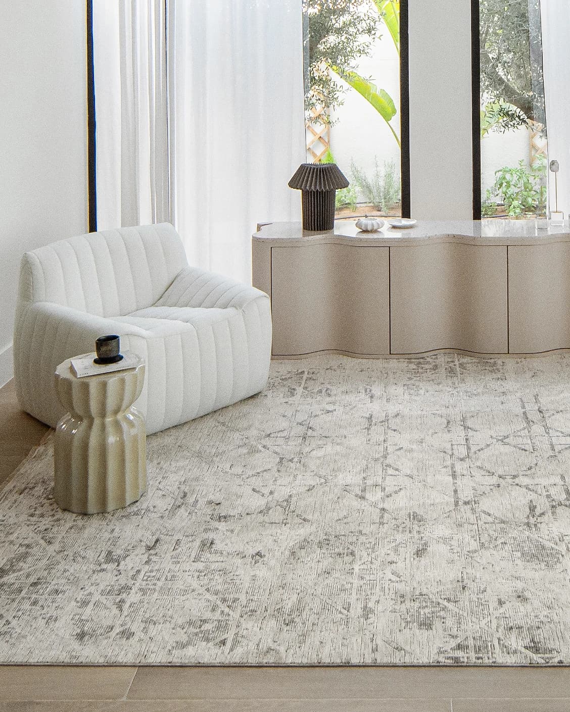 Freida Ashton carpet in grey and beige, shown in a lifestyle front view as image 5