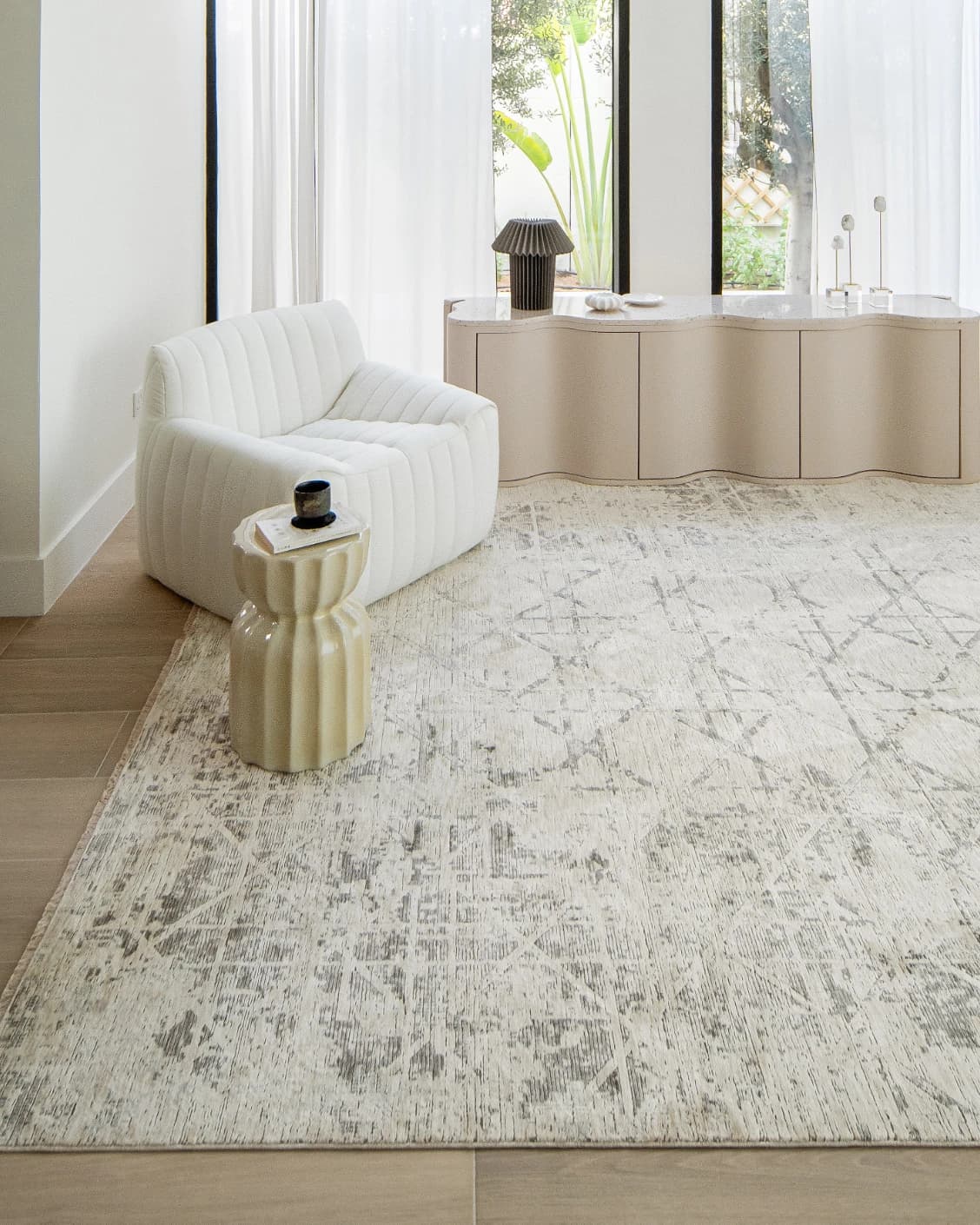 Freida Ashton carpet in grey and beige, shown in a lifestyle front view as image 6