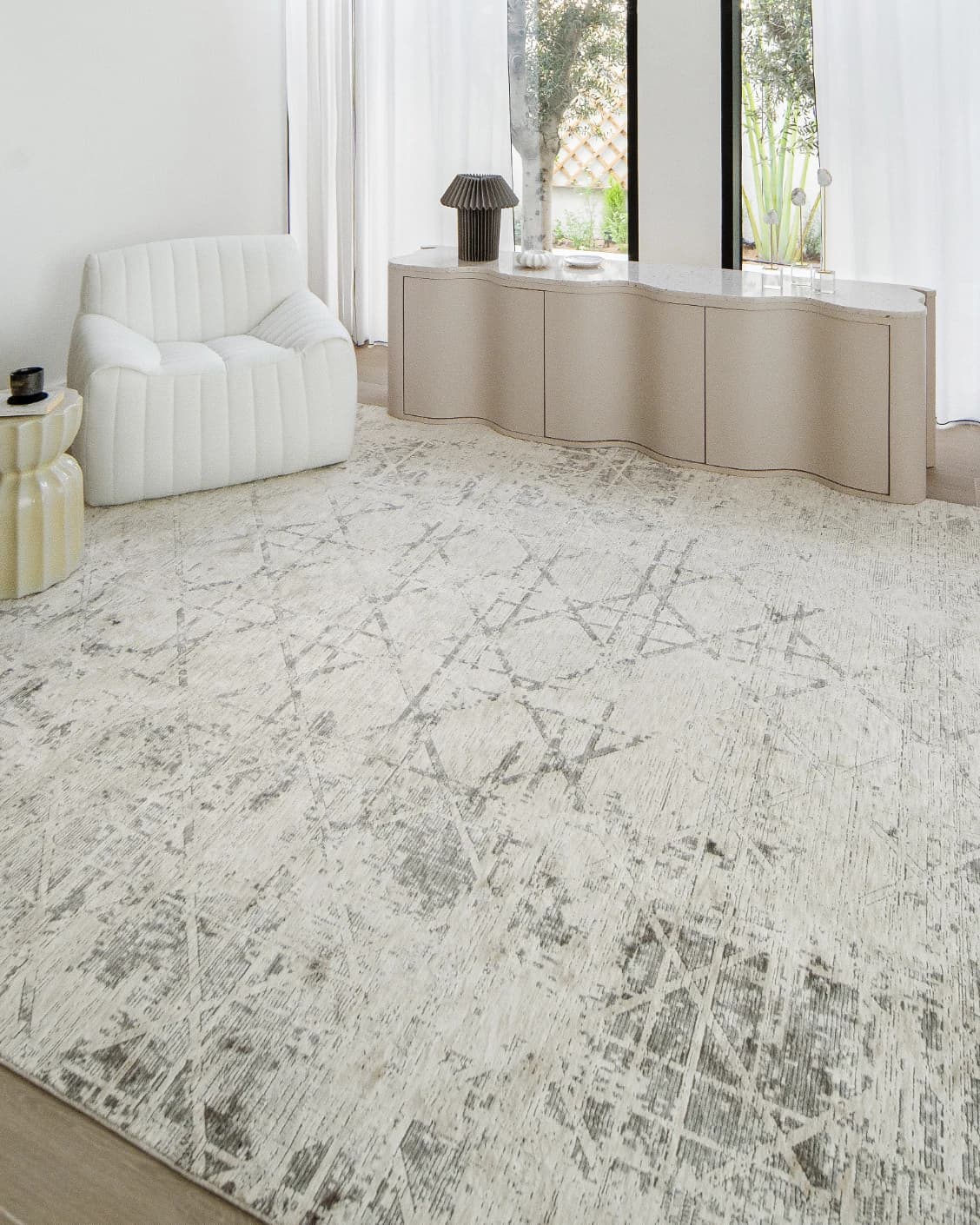 Freida Ashton carpet in grey and beige, shown in a lifestyle right view as image 9