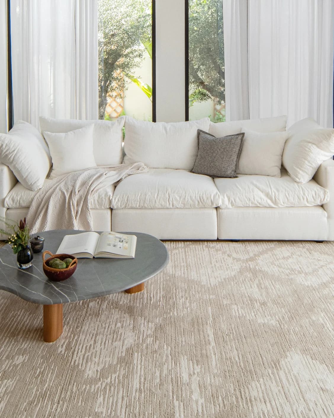 Freida Sandy carpet in beige, shown in a lifestyle front view as image 4
