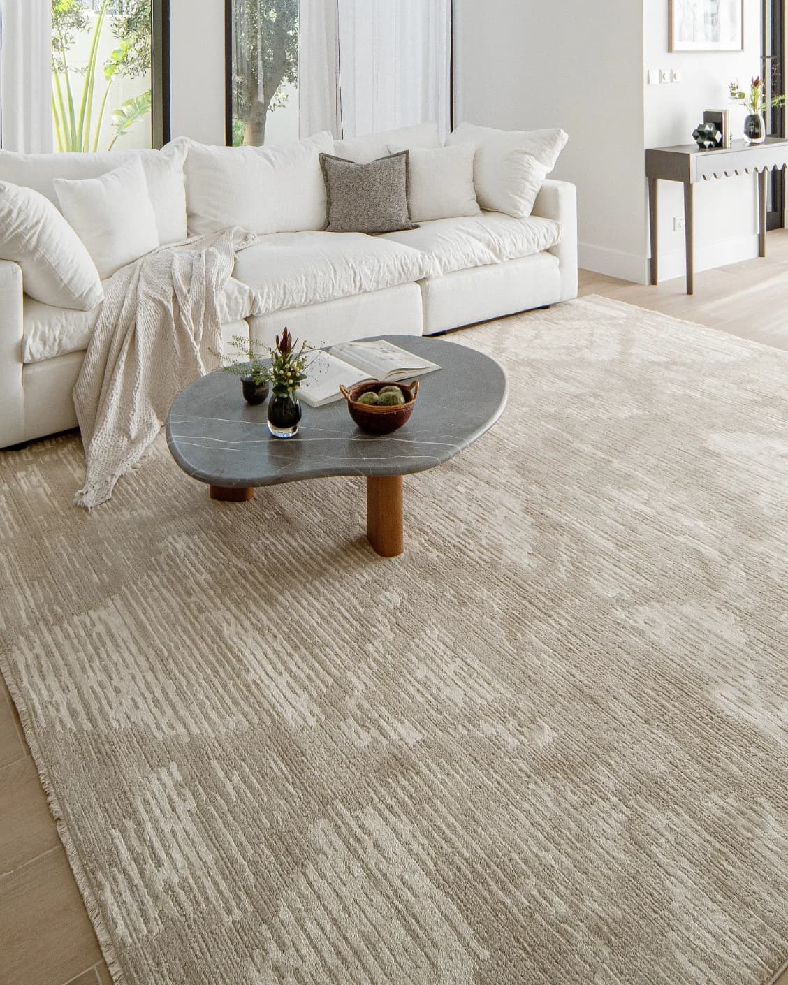 Freida Sandy carpet in beige, shown in a lifestyle left view as image 6