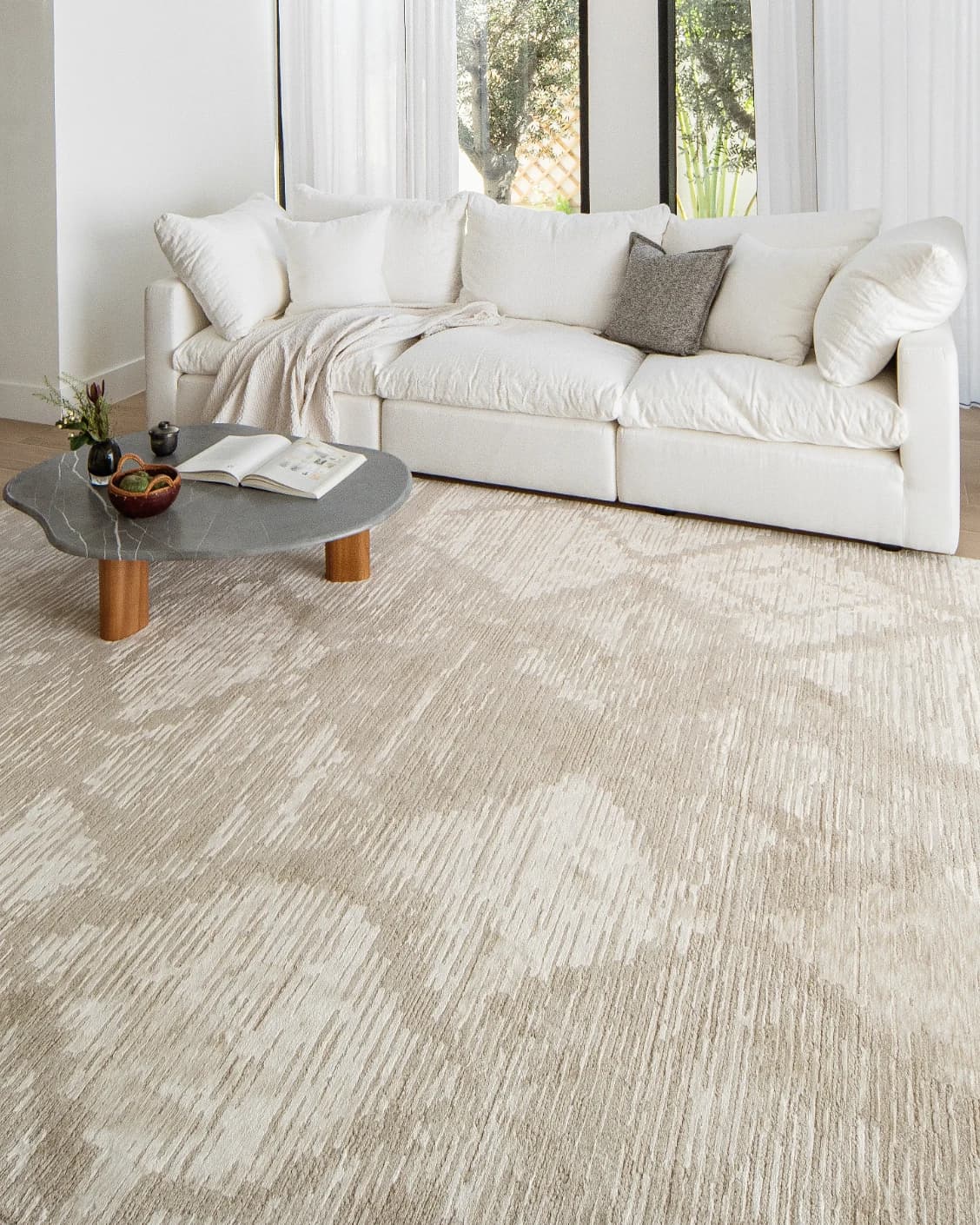 Freida Sandy carpet in beige, shown in a lifestyle right view as image 7