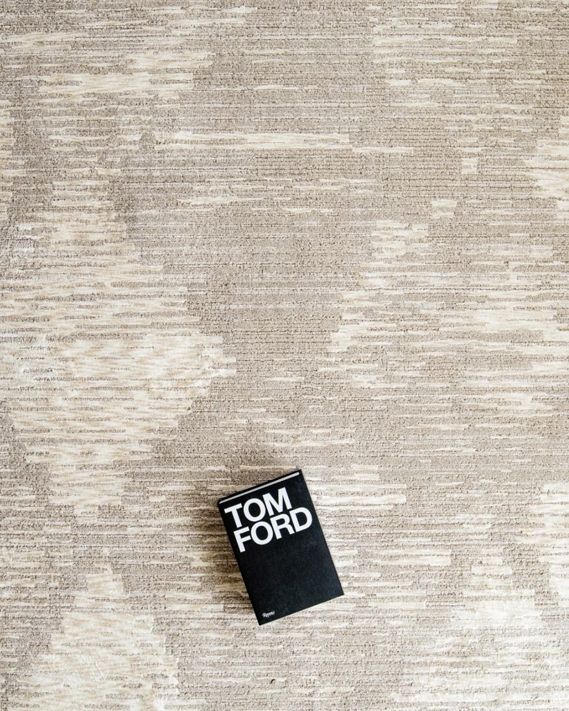 Freida Sandy carpet in beige, shown in a lifestyle top view as image 8