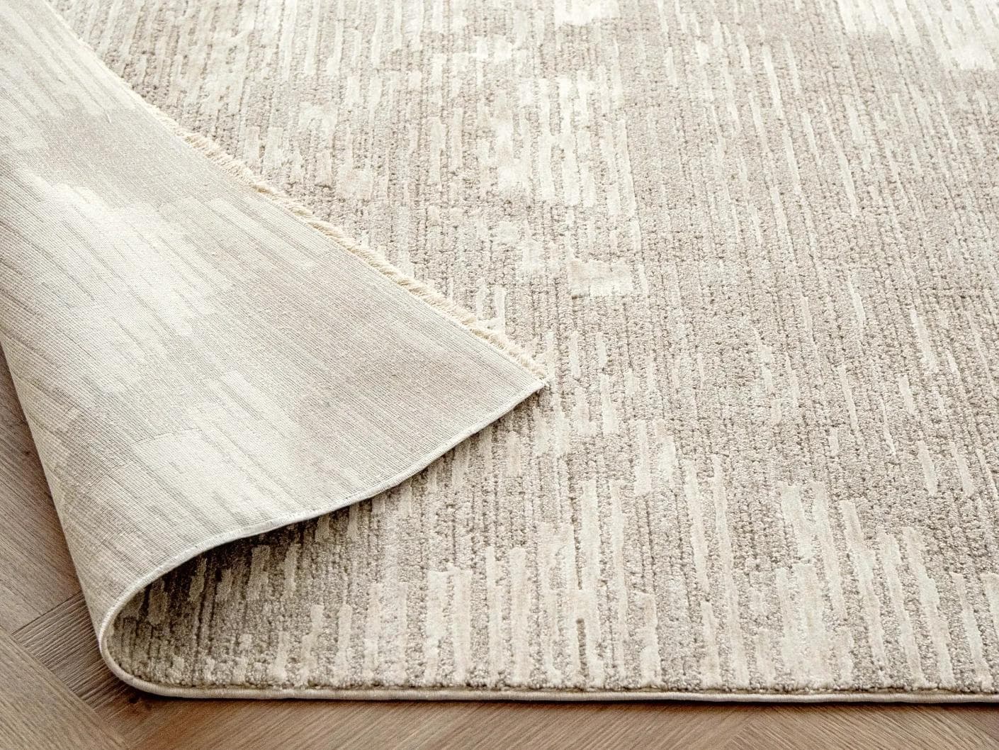 Freida Sandy carpet in beige, shown in a product close-up as image 11