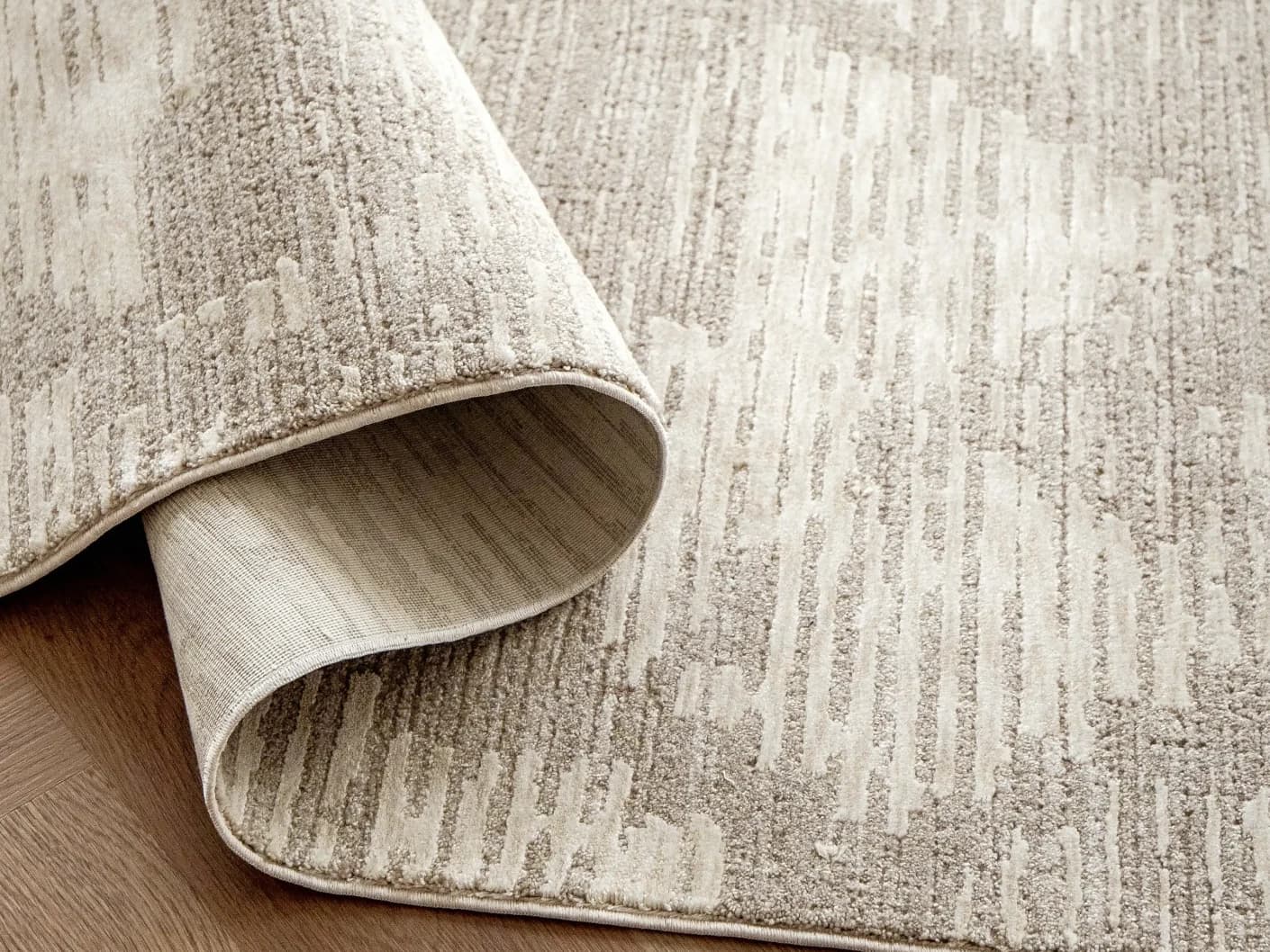Freida Sandy Runners carpets in sandy and beige, shown in a product close-up view