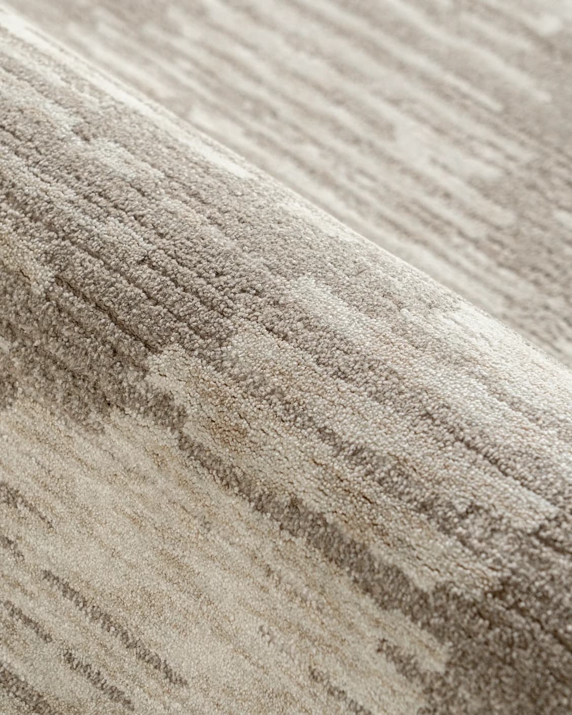 Freida Sandy carpet in beige, shown in a product close-up as image 14