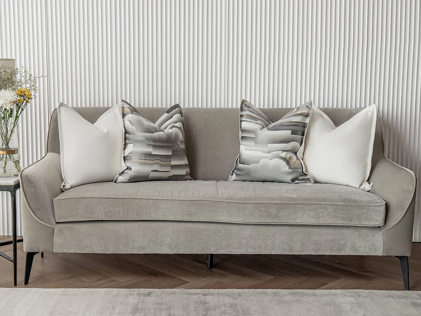 Georgina Bundle cushion in white and grey, shown in a lifestyle front view as image 2