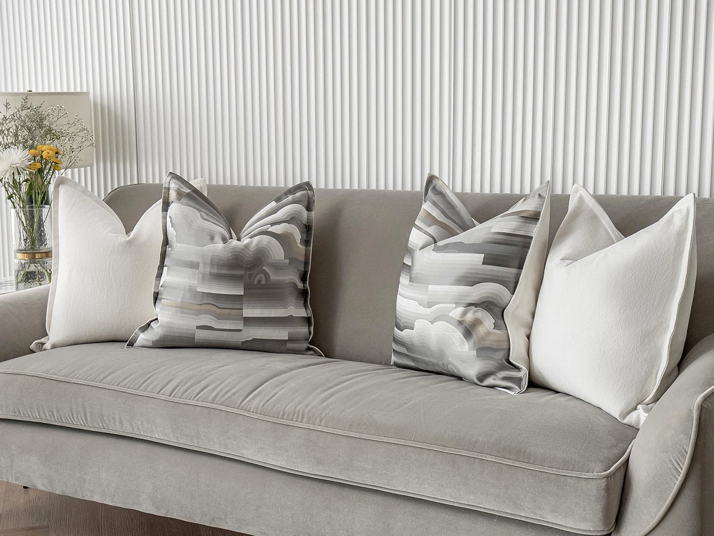 Georgina Bundle cushion in white and grey, shown in a lifestyle right view as image 5