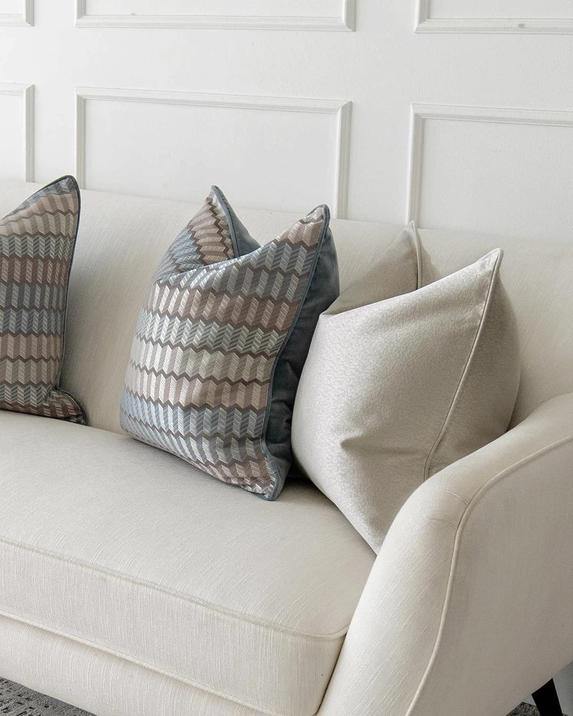 Gina Bundle cushion in silver and blue, shown in a lifestyle right view as image 8