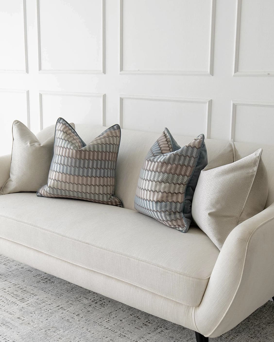 Gina Bundle cushion in silver and blue, shown in a product right view as image 2