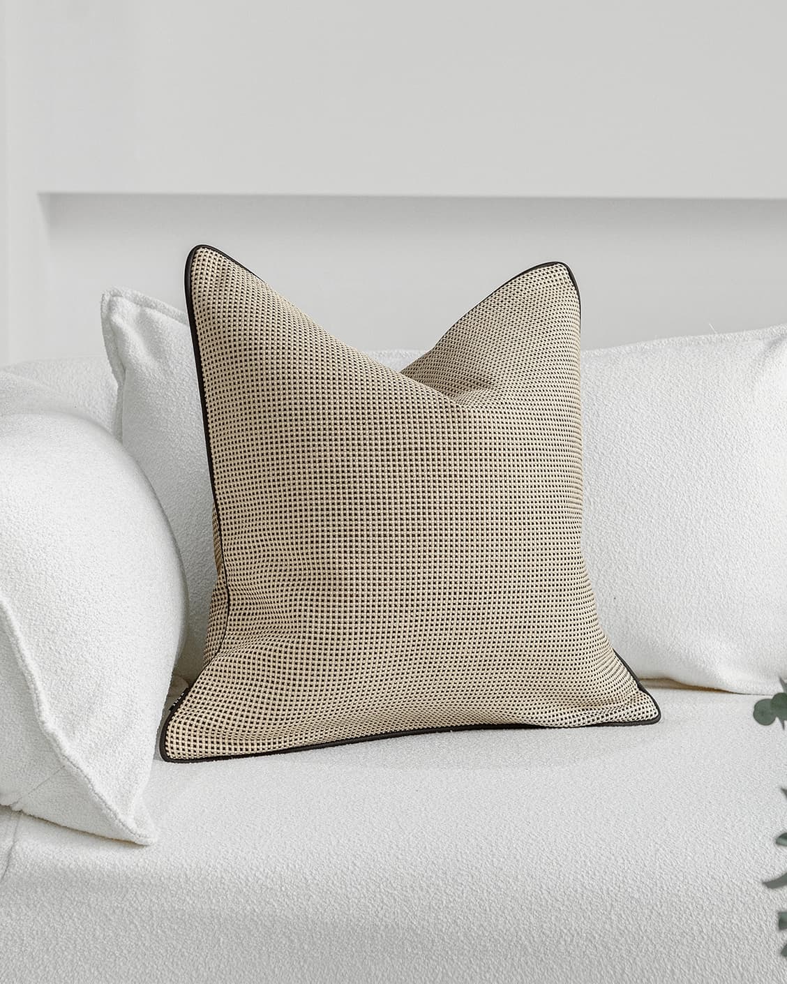 Ginny Laurent cushion in cream, shown in a lifestyle front view as image 2