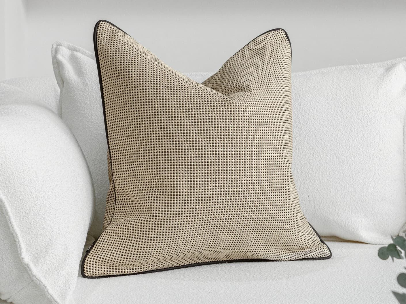 Ginny Laurent single cushions in cream, shown in a lifestyle front view