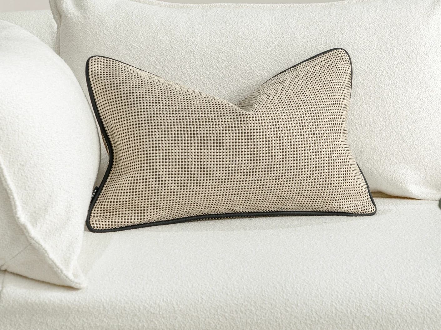 Ginny Laurent II single cushions in cream, shown in a lifestyle front view