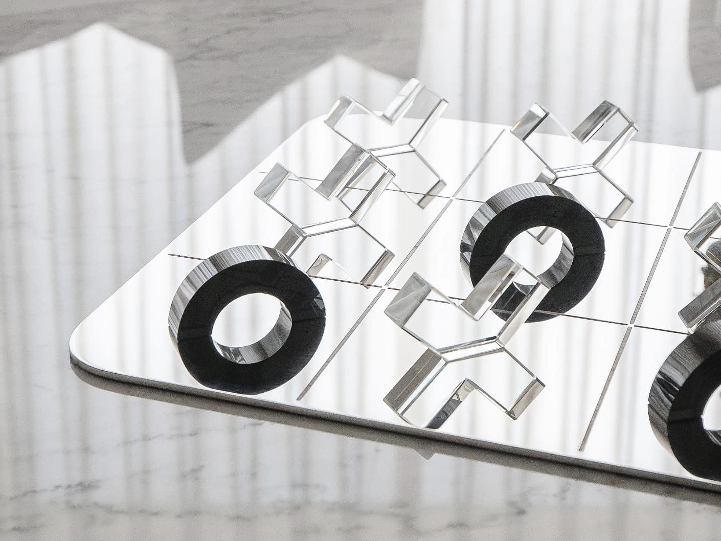 Glacia Malcolm Xo Gameboard statues and sculptures in black, shown in a lifestyle right view