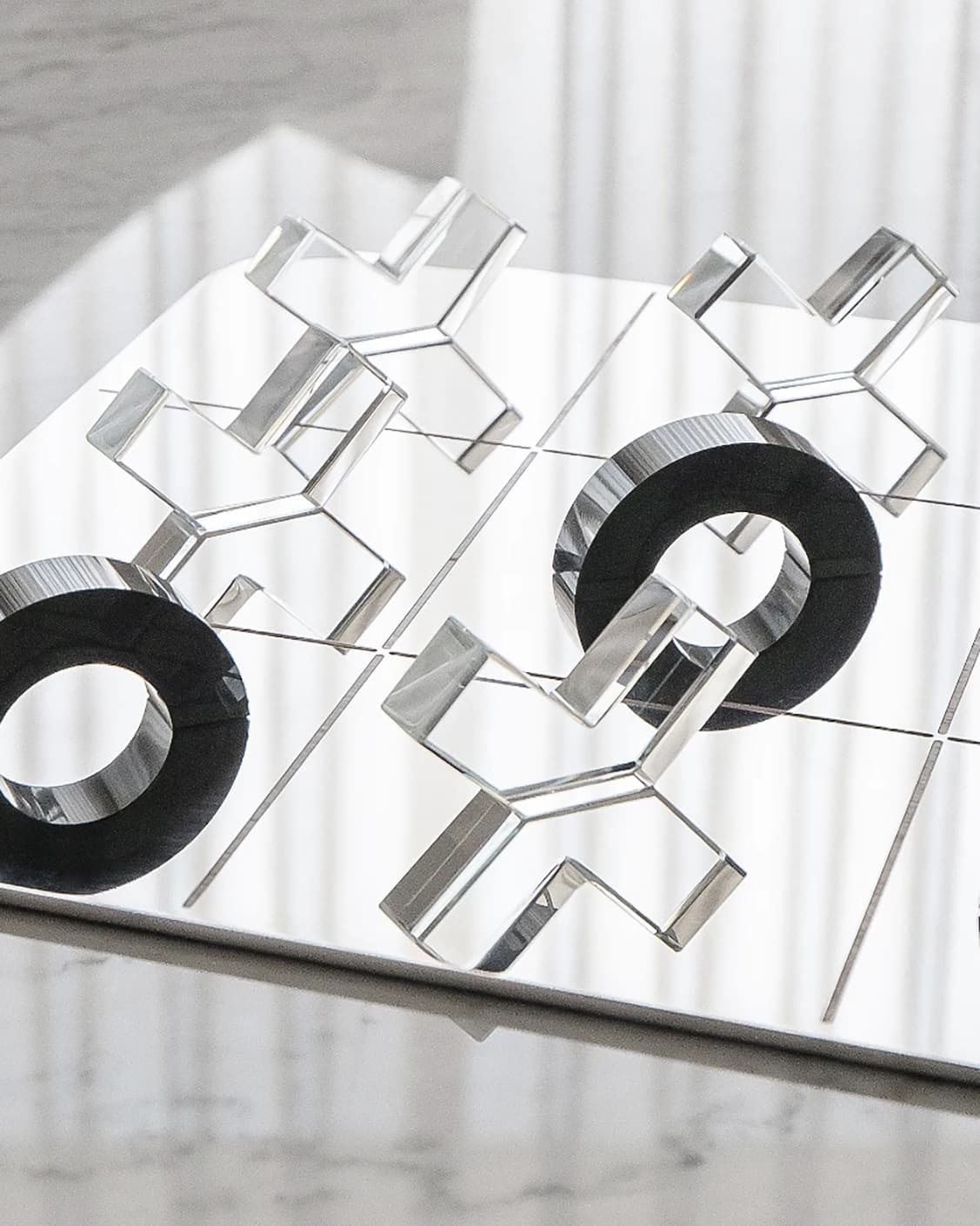 Glacia Malcolm Xo Gameboard statues and sculptures in black, shown in a lifestyle close-up right view as image 4