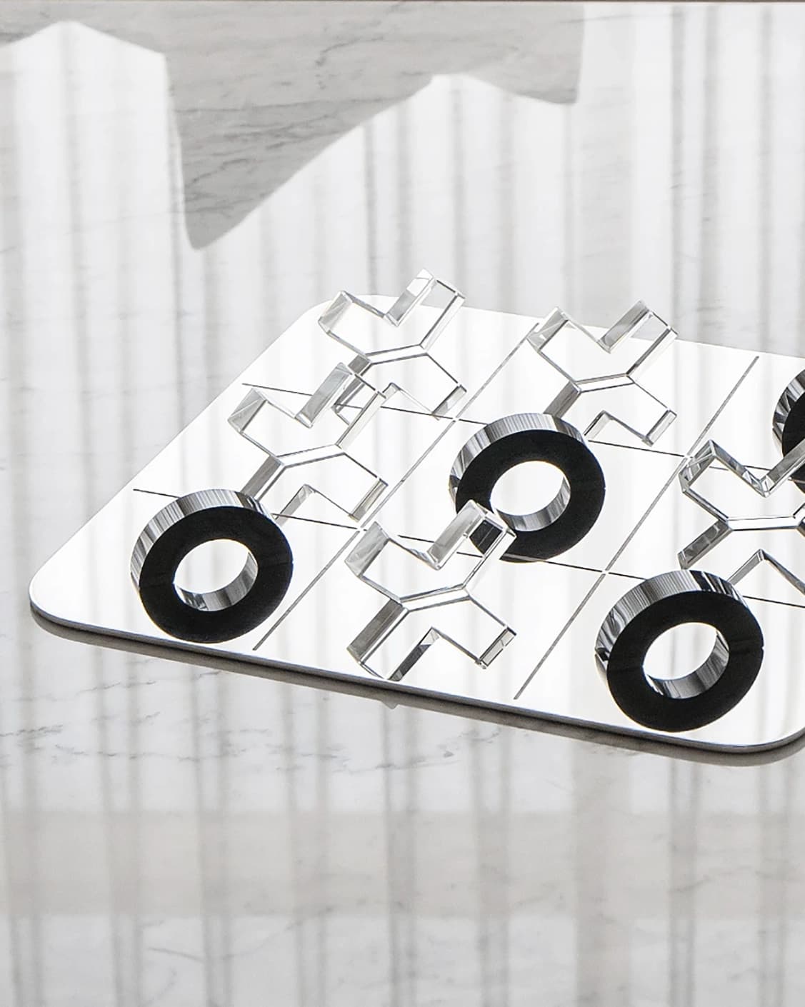 Glacia Malcolm Xo Gameboard statues and sculptures in black, shown in a lifestyle top view as image 5