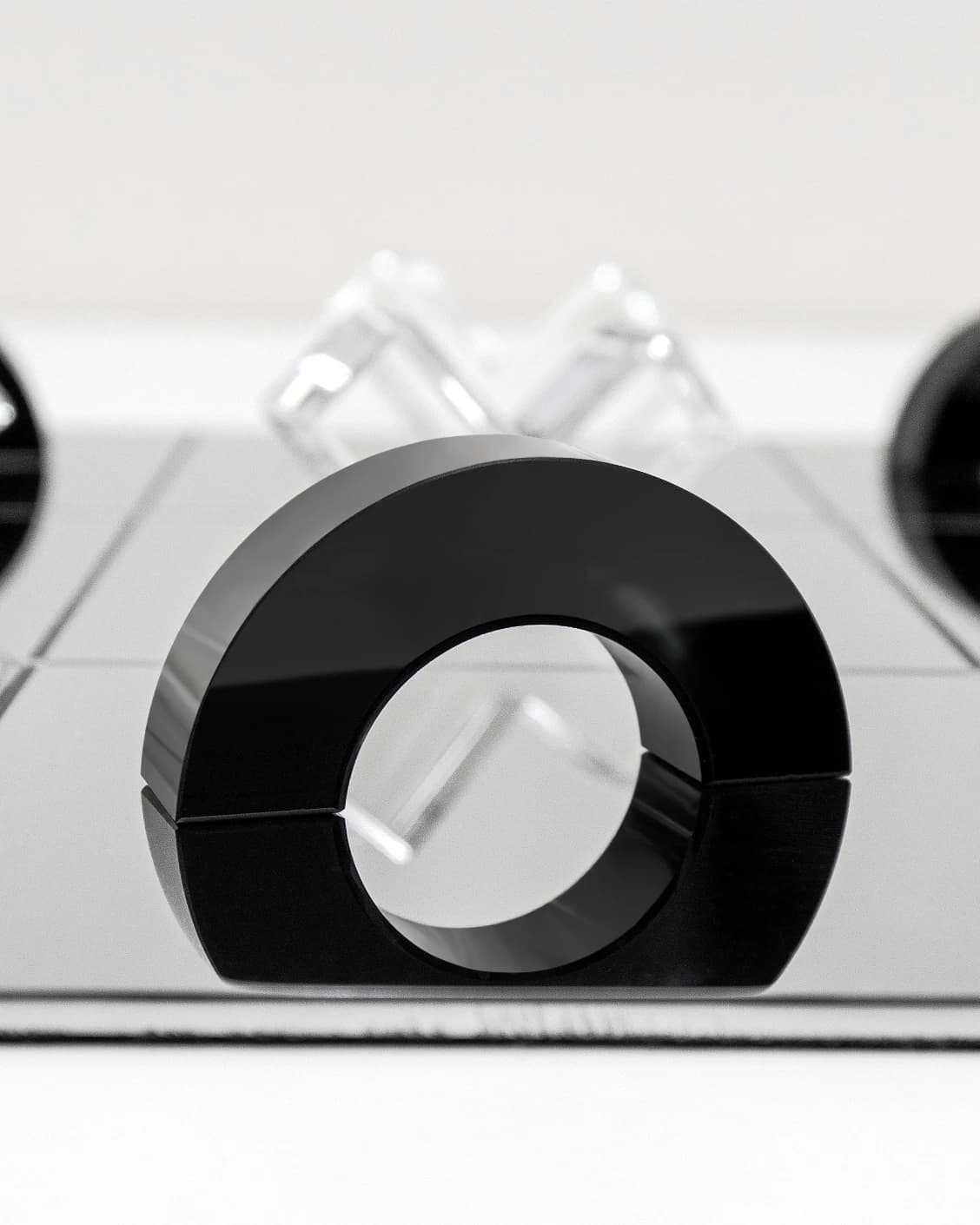 Glacia Malcolm Xo Gameboard statues and sculptures in black, shown in a product close-up top view as image 3