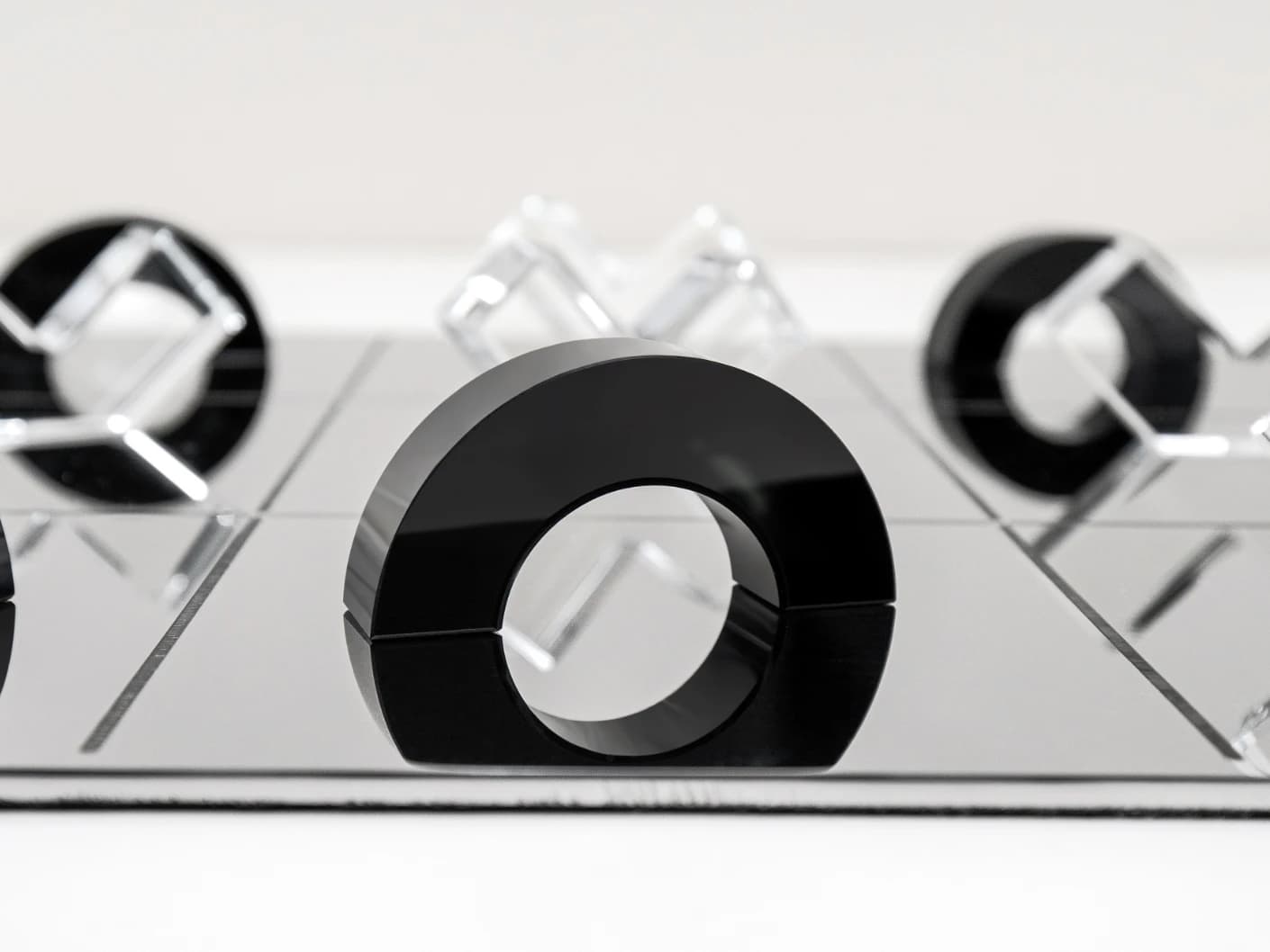 Glacia Malcolm Xo Gameboard statues and sculptures in black, shown in a product close-up top view as image 3