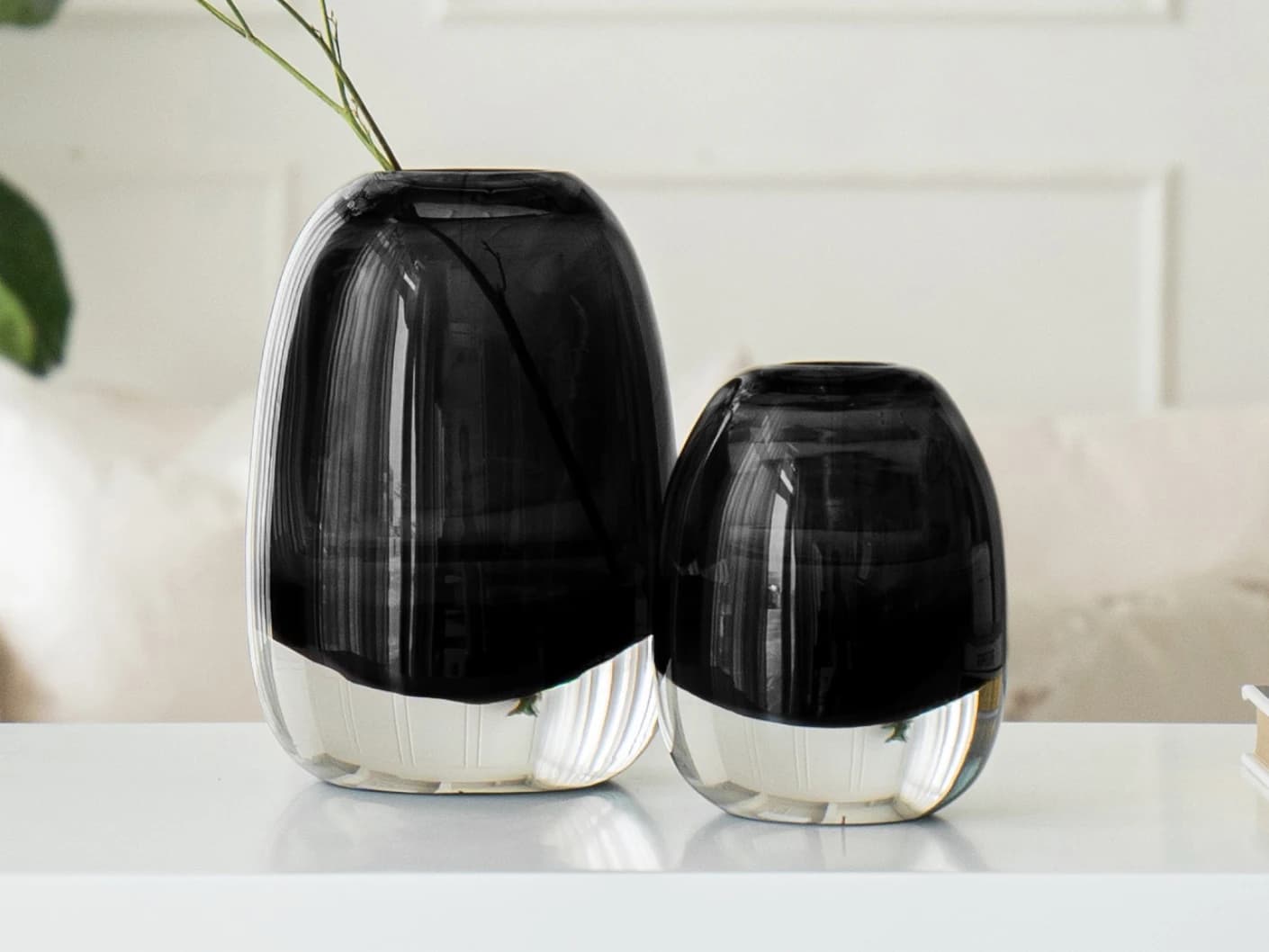 Gracey Storms vases in grey, shown in a lifestyle front view