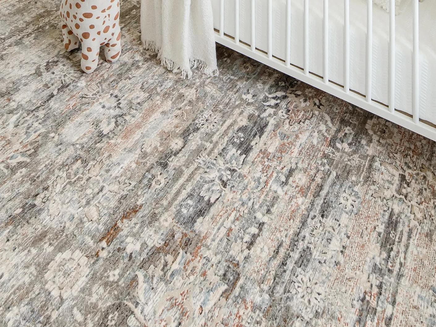 Hana Dune carpets in beige and rust, shown in a lifestyle close-up as image 3
