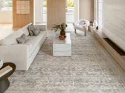 Hana Dune Runners carpet in beige and rust, shown in a lifestyle front view