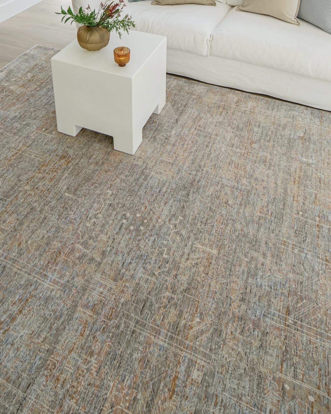 Hana Goldberg carpet in gold, shown in a lifestyle top view as image 10