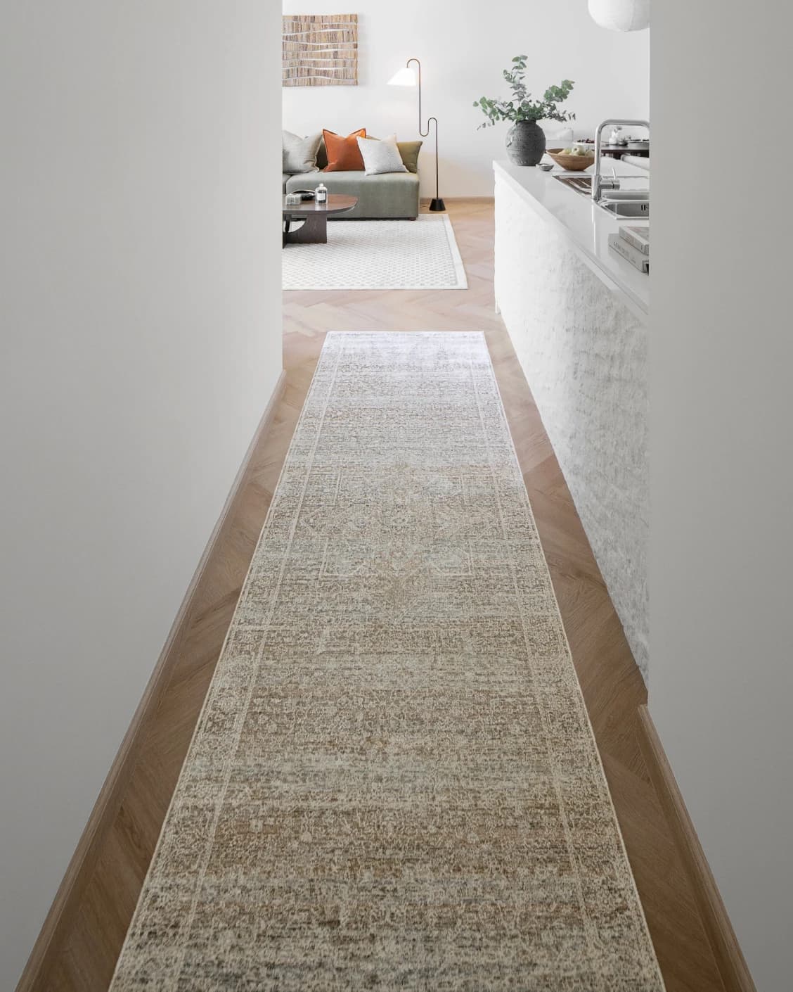 Hana Rust Runners carpet in rust, shown in a lifestyle front view as image 2