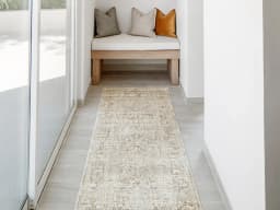 Hana Sandy Runners carpet in beige and taupe, shown in a lifestyle front view