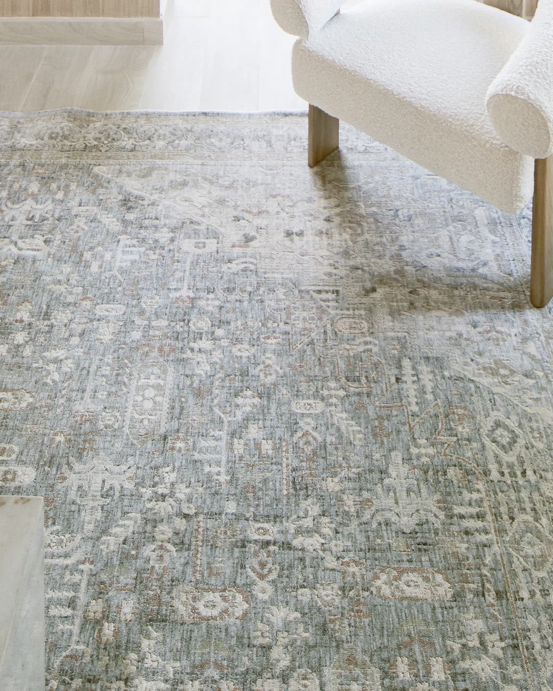 Hana Sky carpet in blue and grey, shown in a lifestyle close-up as image 4