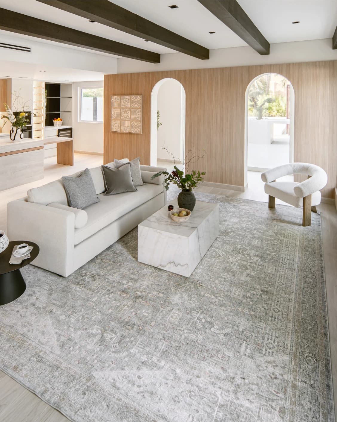 Hana Sky carpet in blue and grey, shown in a lifestyle front view as image 5