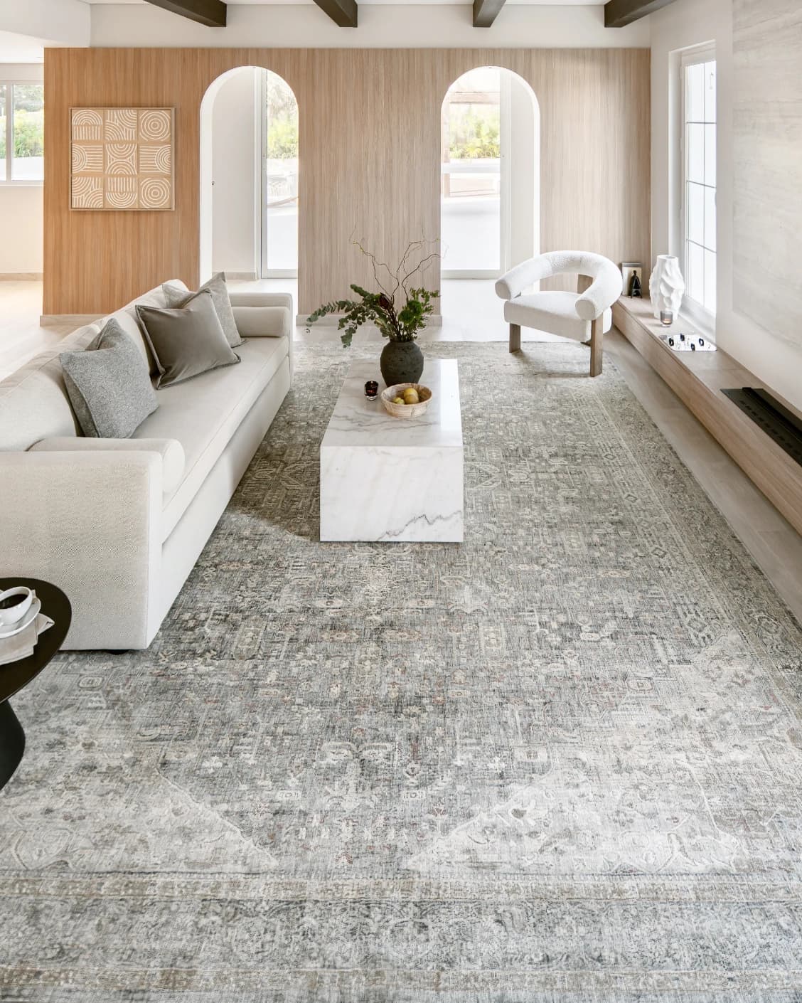 Hana Sky carpet in blue and grey, shown in a lifestyle front view as image 6