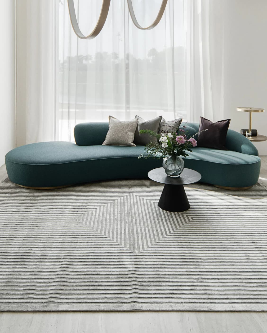 Harf Noon Ashton carpet in grey, shown in a lifestyle front view as image 4
