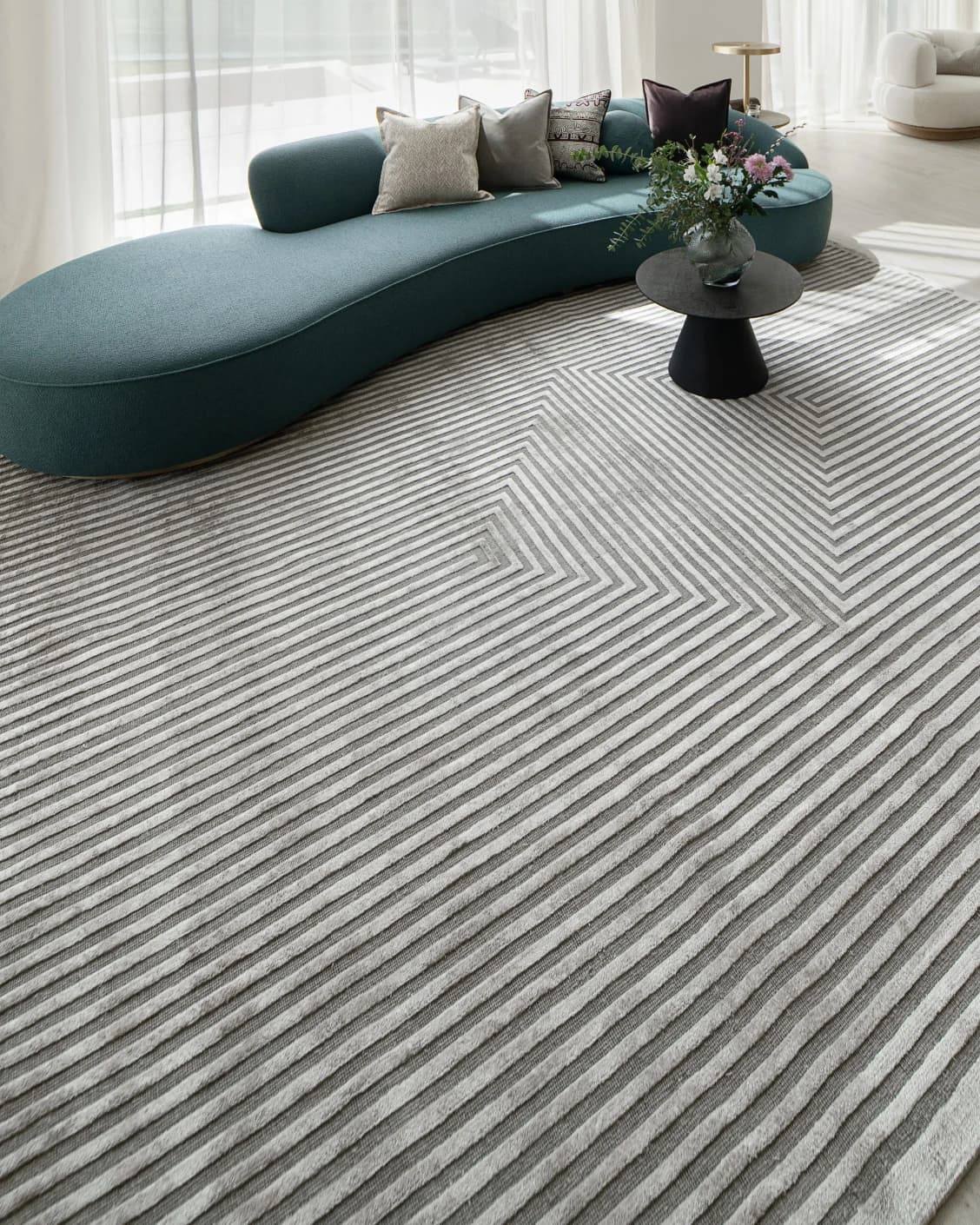 Harf Noon Ashton carpet in grey, shown in a lifestyle left view as image 6