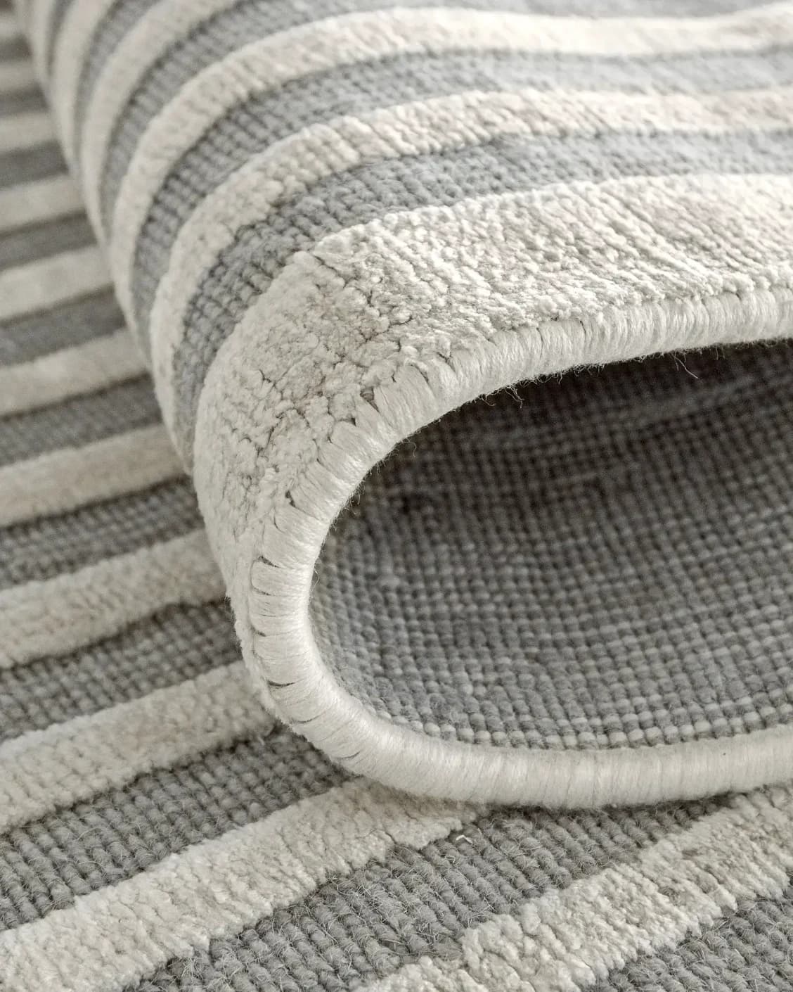 Harf Noon Ashton carpet in grey, shown in a product close-up as image 9