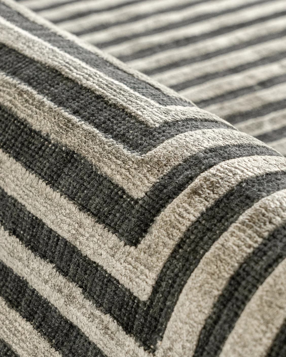 Harf Noon Ebony carpet in charcoal, shown in a product close-up as image 9