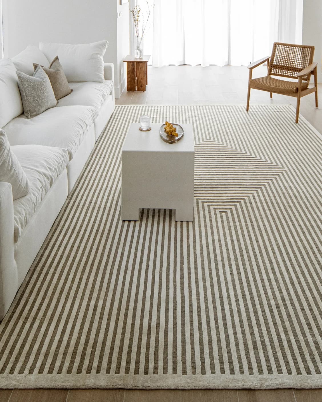 Harf Noon Sandy carpet in beige and ivory, shown in a lifestyle front view as image 4