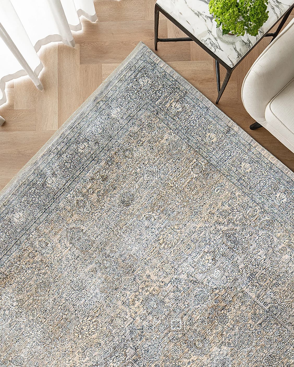 Harper Ashton carpet in grey, shown in a lifestyle top view as image 2