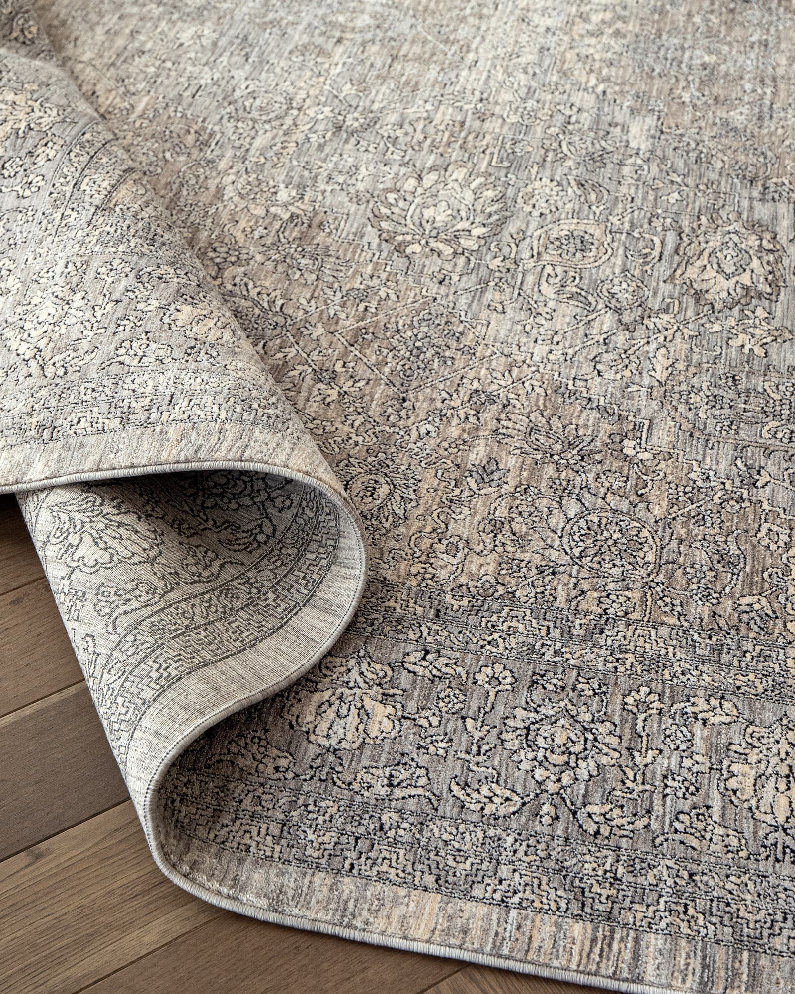 Harper Ashton carpet in grey, shown in a lifestyle top view as image 9