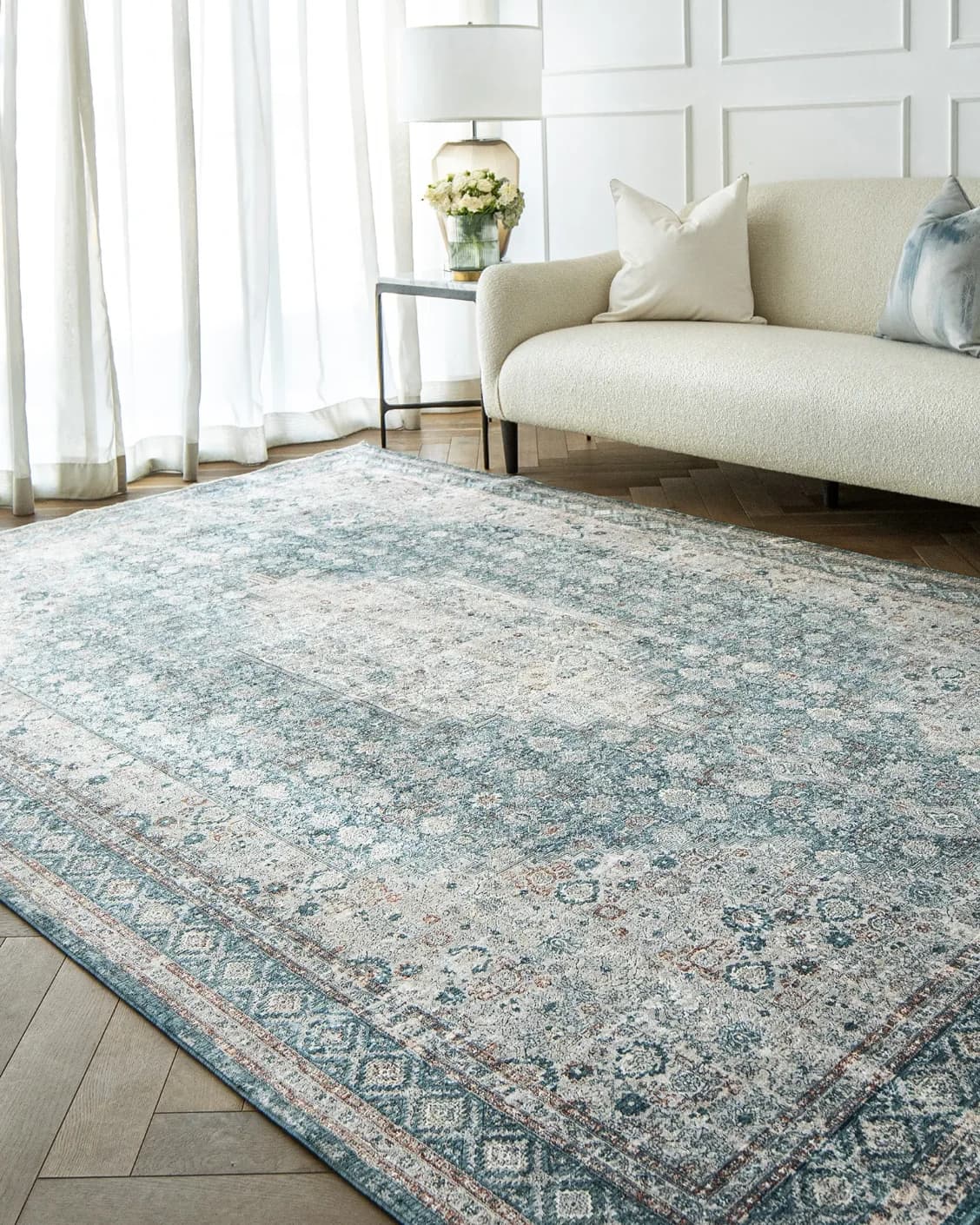 Harper Sky carpet in blue, shown in a lifestyle right view as image 5