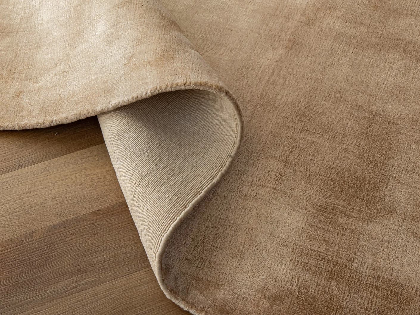 Hartman Sandy carpets in sandy and beige, shown in a product close-up view