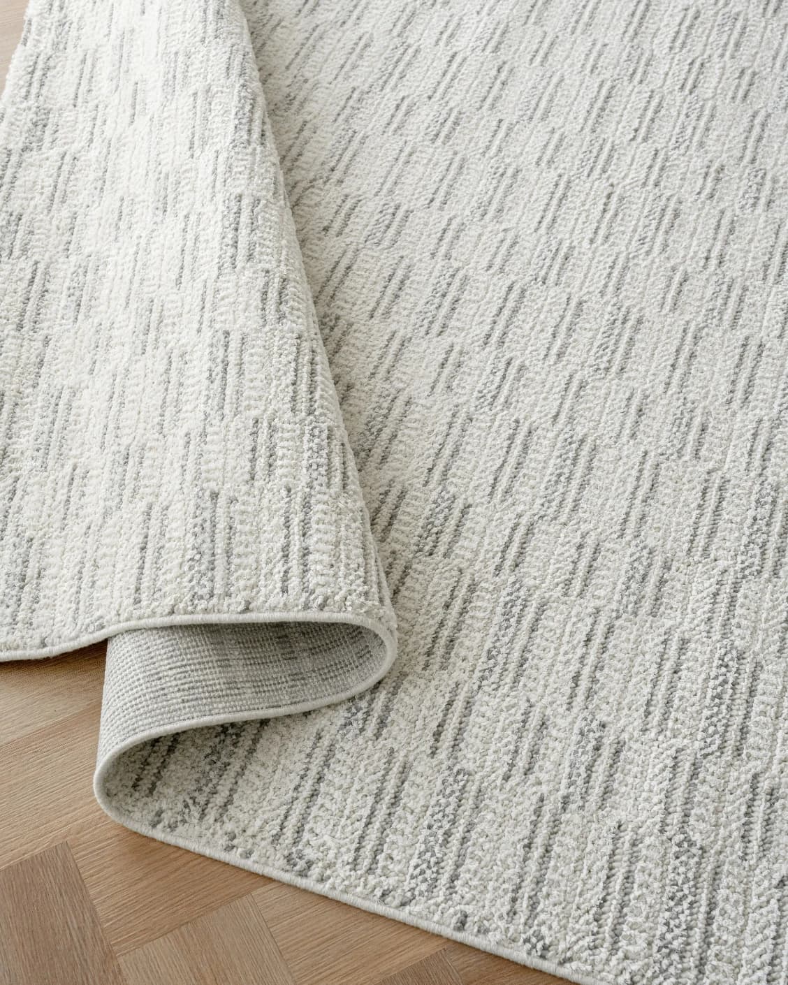 Henry Alba carpet in ivory and grey, shown in a product close-up as image 10