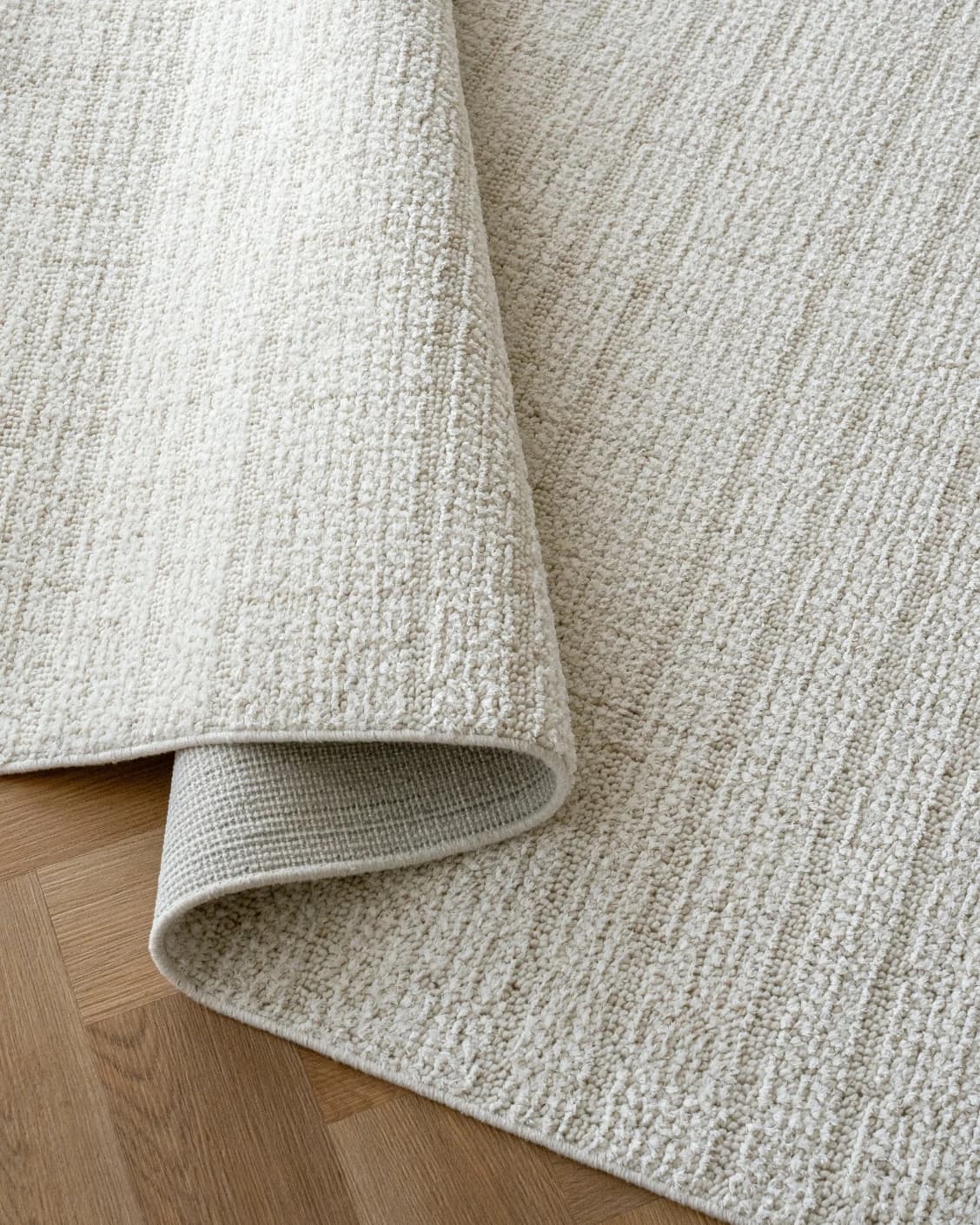 Henry Bianca carpet in ivory and pearl, shown in a product close-up as image 10