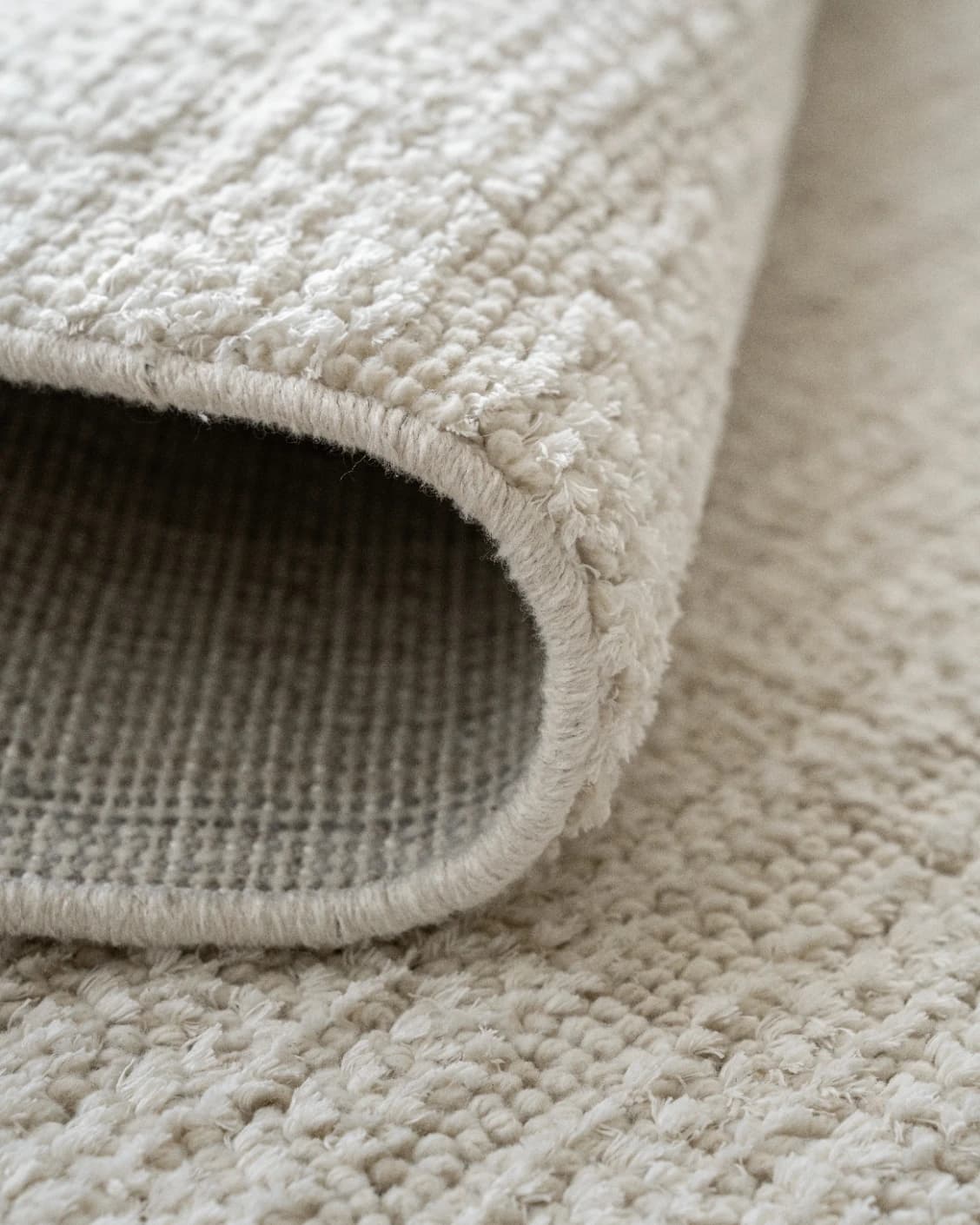 Henry Bianca carpet in ivory and pearl, shown in a product close-up as image 11